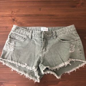 RVCA distressed light green cutoff shorts
